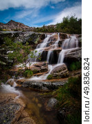 Beautiful waterfall in the National Park of Serra da Estrela in Portugal. Стоковое фото, агентство Ingram Publishing / Фотобанк Лори