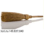 Whisk broom with reflection isolated on white background. Стоковое фото, агентство Ingram Publishing / Фотобанк Лори