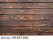 Old wooden board painted dark color. Стоковое фото, агентство Ingram Publishing / Фотобанк Лори