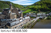 Estaing chateau. Aerial photo. River and Castle. Beautiful village in France. Редакционное фото, фотограф Ignacio Martinez / Фотобанк Лори