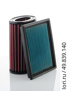 Air filters on white background. Vehicle Modification Accessories. Стоковое фото, агентство Ingram Publishing / Фотобанк Лори