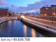 Gamla Stan Highway to Stockholm Cityscape at dusk Sweden. Стоковое фото, агентство Ingram Publishing / Фотобанк Лори