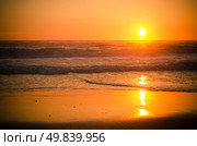 Sunset at a sandy beach with clear sky. Стоковое фото, агентство Ingram Publishing / Фотобанк Лори