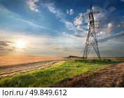 Electric pole in the autumn field at sunrise. Стоковое фото, агентство Ingram Publishing / Фотобанк Лори