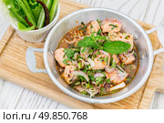 Thai Style Spicy Salmon salad with fresh vegetable. Стоковое фото, агентство Ingram Publishing / Фотобанк Лори