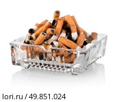 Heap of butts in a square ashtray. Стоковое фото, агентство Ingram Publishing / Фотобанк Лори