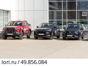 Russia, Samara. 23. 04 2025. Cars of the Chinese company Jianghuai Automobile Co are in the showroom for sale on a sunny summer day. Редакционное фото, фотограф Акиньшин Владимир / Фотобанк Лори
