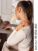 Struggles of a Lonely Woman Grappling With Emotions in a Quiet Indoor Space at Dusk. Стоковое фото, фотограф Aleksandr Golubev / Фотобанк Лори