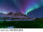 The Heart Northern Light Aurora borealis at Kirkjufell Iceland. Стоковое фото, агентство Ingram Publishing / Фотобанк Лори