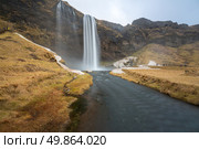 seljalandsfoss waterfall on the South of Iceland. Стоковое фото, агентство Ingram Publishing / Фотобанк Лори