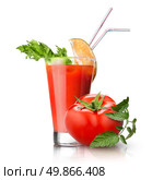 red tomato and glass of juice isolated on white. red tomato and glass of juice on white. Стоковое фото, агентство Ingram Publishing / Фотобанк Лори