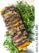 shashlik with potherbs on the plate. Стоковое фото, агентство Ingram Publishing / Фотобанк Лори