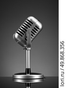 Retro microphone on grey. Стоковое фото, агентство Ingram Publishing / Фотобанк Лори