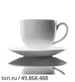 white cup and saucer on white . Стоковое фото, агентство Ingram Publishing / Фотобанк Лори