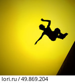 silhouette of roller boy jumping in air. Стоковое фото, агентство Ingram Publishing / Фотобанк Лори