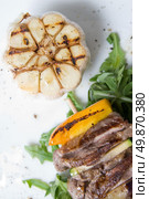 shashlik with potherbs on the plate. Стоковое фото, агентство Ingram Publishing / Фотобанк Лори