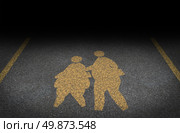 Obesity in children and childhood obese concept with a yellow painted asphalt road sign showing an icon of overweight kids and young students as a warning to the hazards of eating junk food and fatty fast food. Стоковое фото, агентство Ingram Publishing / Фотобанк Лори