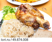 german deep fried and roasted pork knuckle. Стоковое фото, агентство Ingram Publishing / Фотобанк Лори