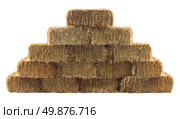 Bale of hay group in a pyramid wall pattern isolated on a white background as a country living design element and agriculture farm and farming symbol of harvest time with dried grass straw as bundled tied haystacks. Стоковое фото, агентство Ingram Publishing / Фотобанк Лори