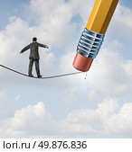 Changing strategy business concept with a businessman walking on a high wire tight rope that is being erased by a pencil eraser as an icon of conquering new adversity and challenges. Стоковое фото, агентство Ingram Publishing / Фотобанк Лори