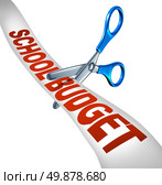 School budget cuts symbol for reducing budgeted education expenditures by slashing music and arts programs and eliminating financial surplus represented by student scissors cutting a receipt like ribbon as an icon of teaching cutbacks. Стоковое фото, агентство Ingram Publishing / Фотобанк Лори