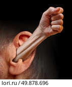 Power of being listened to and being heard as a social psychology concept of communication respect fighting for the rights of people and emotions as an arm with a fist emerging out of a human ear. Стоковое фото, агентство Ingram Publishing / Фотобанк Лори