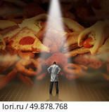 Medical diet advice health care concept with a doctor or dietician standing in front of a mountain of greasy junk food as hamburgers hotdogs and french fries as a symbol of professional dieting guidance from a physician to avoid cholesterol and fat. Стоковое фото, агентство Ingram Publishing / Фотобанк Лори