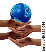 Global education community as children learning and development concept with a group of hands representing ethnic groups of young people cooperating together as friends to hold a world planet. Стоковое фото, агентство Ingram Publishing / Фотобанк Лори
