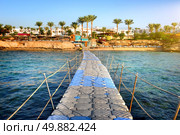 Pontoon through coral reef to the sea. Стоковое фото, агентство Ingram Publishing / Фотобанк Лори