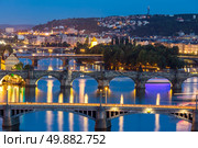 view of Bridges on Vltava, Prague at dusk, Czech Republic. Стоковое фото, агентство Ingram Publishing / Фотобанк Лори