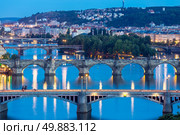 view of Bridges on Vltava, Prague at dusk, Czech Republic. Стоковое фото, агентство Ingram Publishing / Фотобанк Лори