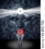 Leadership support concept as a businessman holding the missing key cog to a large corporation as a group of gears shaped as a human face as a symbol and metaphor for workers contributing new business ideas and innovative content. Стоковое фото, агентство Ingram Publishing / Фотобанк Лори