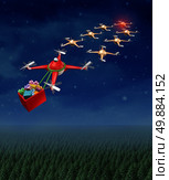 Drone christmas sled concept as group of organized drones in a reindeer sleigh formation with a santaclause flying quadrocopter delivering gifts. Стоковое фото, агентство Ingram Publishing / Фотобанк Лори