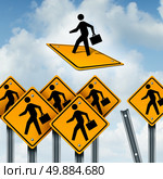 Winner concept and leader of business competition as a group of road signs with workers and an ambitious individual breaking free and taking off as a metaphor for leadership. Стоковое фото, агентство Ingram Publishing / Фотобанк Лори
