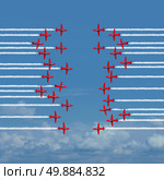 Destructive business strategy concept as two reckless groups of opposing airplanes or acrobatic jets facing off in an irresponsible thoughtless and dangerous confronttation that puts all members in peril. Стоковое фото, агентство Ingram Publishing / Фотобанк Лори