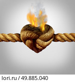 Divorce and separation concept as a rope with a burning knot shaped as a love heart as a relationship problem symbol or infidelity crisis icon between a couple. Стоковое фото, агентство Ingram Publishing / Фотобанк Лори