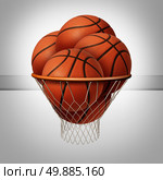 Prosperity concept and over the top success symbol as a group of basketballs inside a basketball net as an icon for exessive profit as a business metaphor. Стоковое фото, агентство Ingram Publishing / Фотобанк Лори
