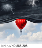 Positive outlook and recovery concept as a person or businessman riding a red hot air balloon lifting the dangerous dark stormy skies to reveal a bright warm blue sky as a mindset symbol of managing economic or emotional perception. Стоковое фото, агентство Ingram Publishing / Фотобанк Лори