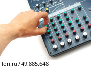 Hand and sound mixing console. Element of design. Стоковое фото, агентство Ingram Publishing / Фотобанк Лори