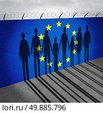 Europe immigration and european refugee crisis concept as people on a border wall with a Eurozone flag as a social issue on refugees or illegal immigrants with the shadow of a group of migrants. Стоковое фото, агентство Ingram Publishing / Фотобанк Лори