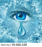 Winter blues seasonal affective disorder or depression and cold grey season lonesome anxiety and emotional crisis concept as a human eyeball crying a tear behind layers of ice as a metaphor for sadness. Стоковое фото, агентство Ingram Publishing / Фотобанк Лори