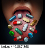 Pills and medicine medical concept as a group of prescription drugs and nutritional supplements on the tongue of a patient as a medication issues symbol and pharmaceutical risk metaphor. Стоковое фото, агентство Ingram Publishing / Фотобанк Лори
