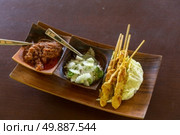 Delicious Asian Cuisine Chicken Satay Curry. Стоковое фото, агентство Ingram Publishing / Фотобанк Лори