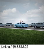 Driverless car and autonomous driving concept and safety system symbol as a road with cars and one vehicle with human hands and arms waving up to the sky as a metaphor for hands free autopilot. Стоковое фото, агентство Ingram Publishing / Фотобанк Лори