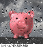 Rainy day fund as a piggy bank holding money set aside for financial challenges as a 3D illustration of a piggy bank as a glass with water drops or droplets. Стоковое фото, агентство Ingram Publishing / Фотобанк Лори