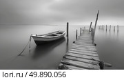 A boat is stationary in the calm water, gently bobbing with the ripples. The boat is surrounded by the stillness of the water. Стоковое AI-изображение, AI-художник Данила Большаков / Фотобанк Лори