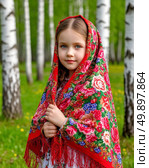 A little Russian beauty in a bright Pavlovo Posad shawl against the backdrop of birches. Стоковое AI-изображение, AI-художник Сергей Елизарьев / Фотобанк Лори