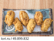 korean fried chicken with sesame on a plate. Стоковое фото, агентство Ingram Publishing / Фотобанк Лори