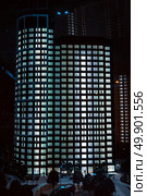 Model of modern skyscraper with bright windows at night. Стоковое фото, фотограф Евгений Ткачёв / Фотобанк Лори