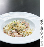 gourmet spaghetti carbonara italian cuisine. Стоковое фото, агентство Ingram Publishing / Фотобанк Лори